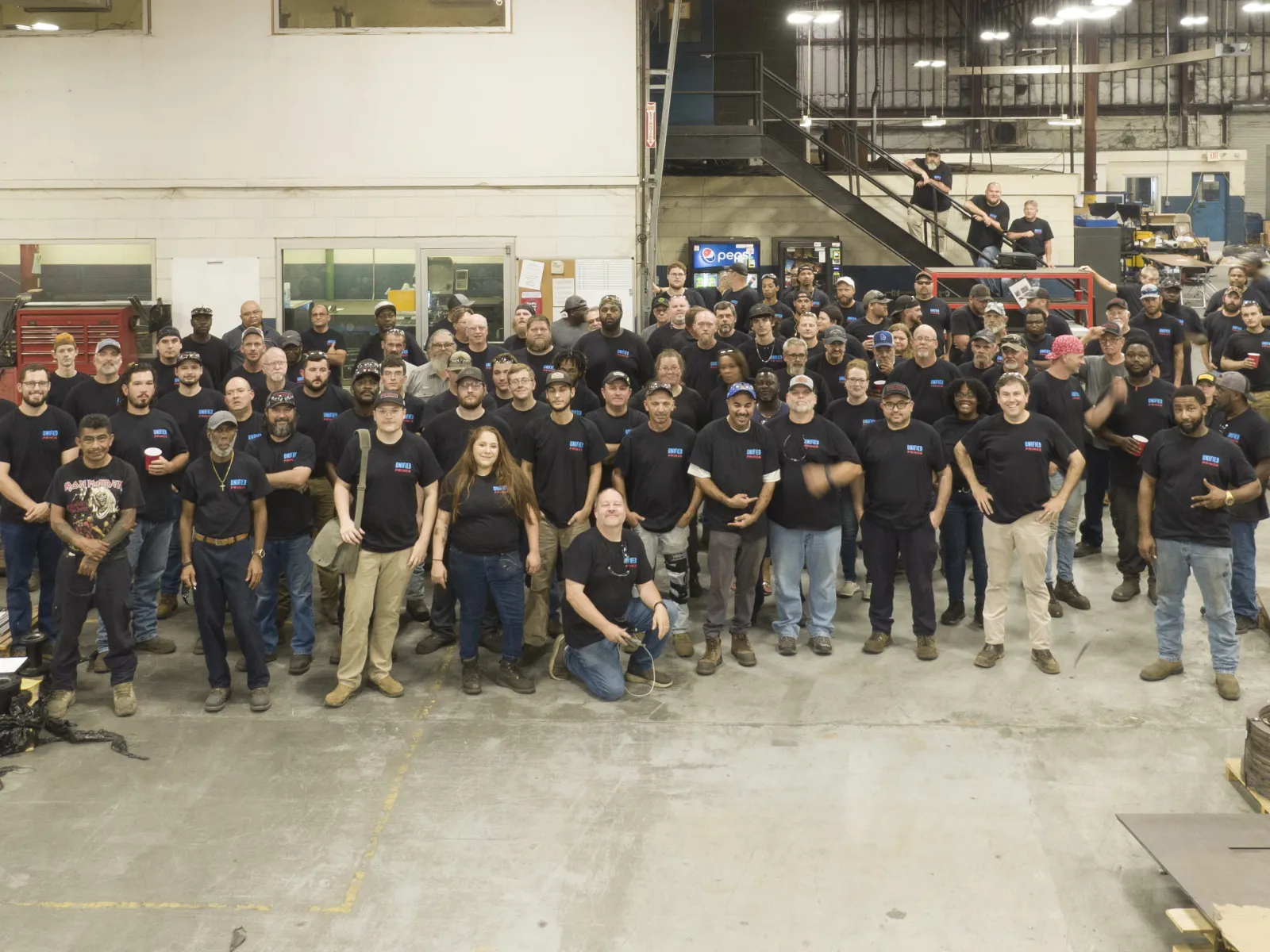 a group of people posing for a photo