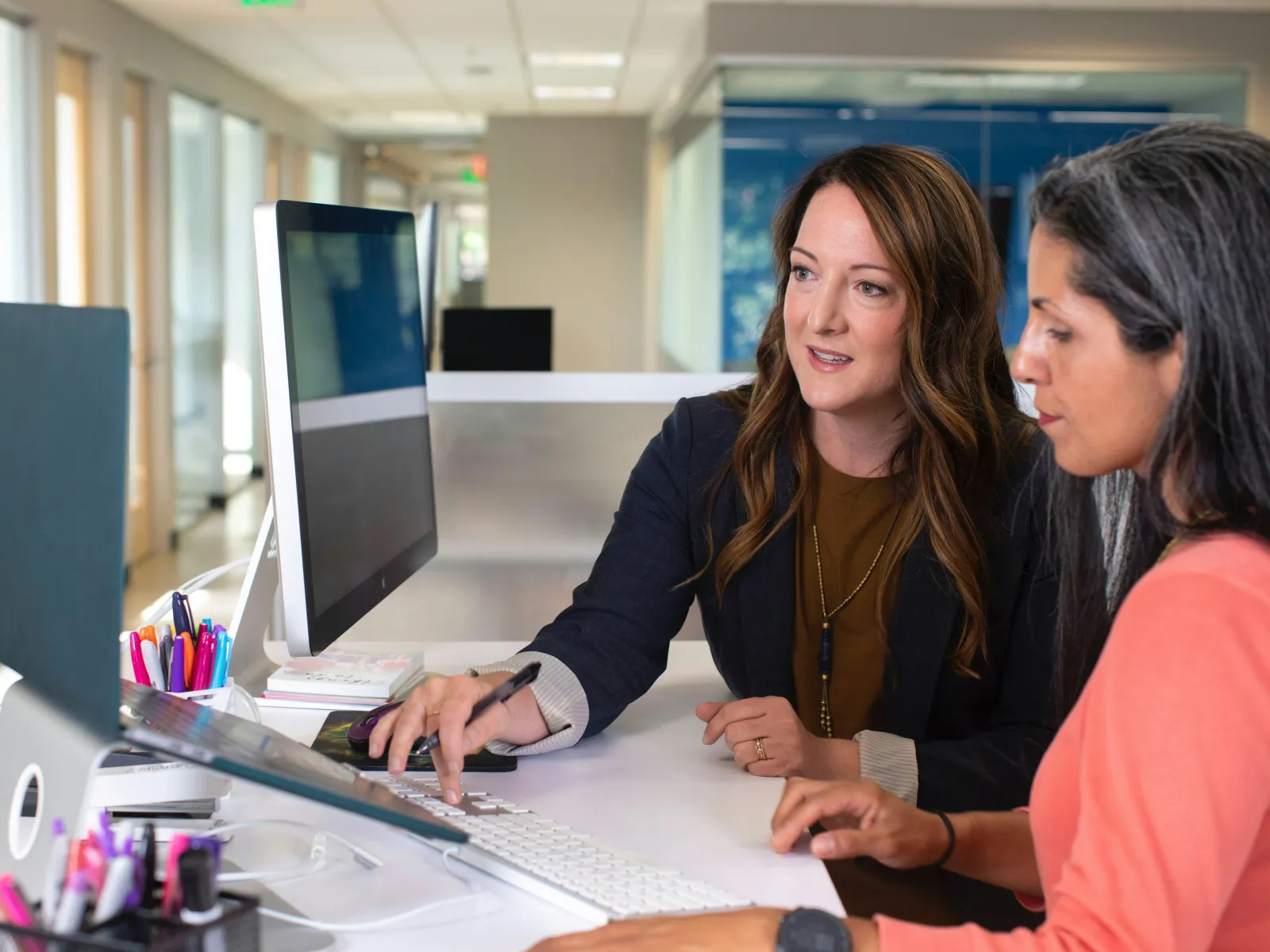 women looking at a computer screen