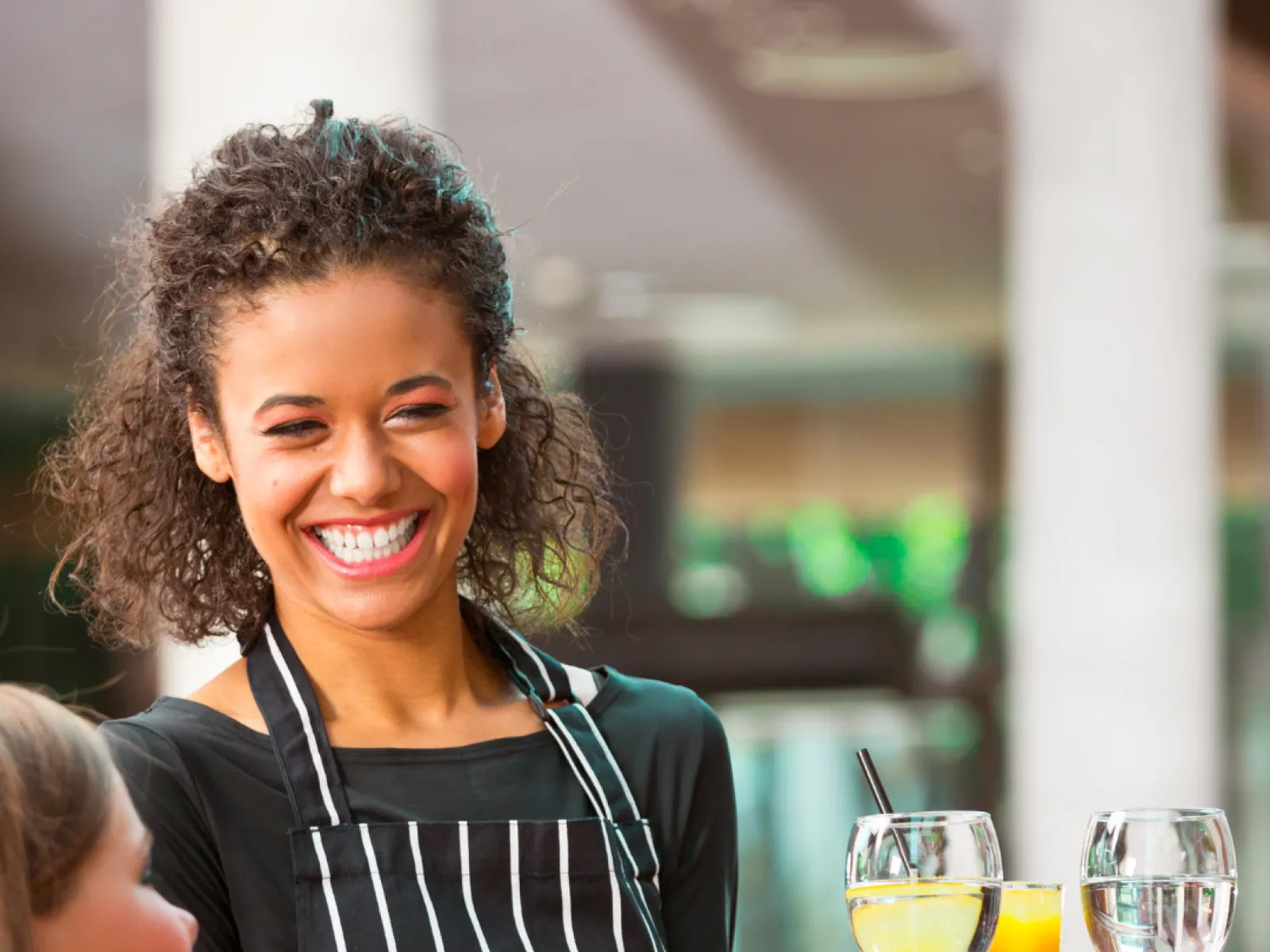 a woman holding a plate of food