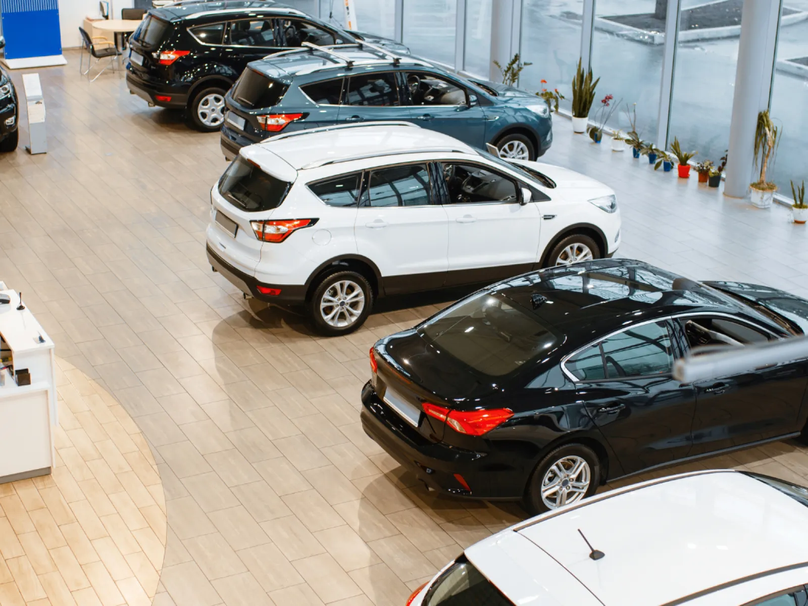 a group of cars parked in a building