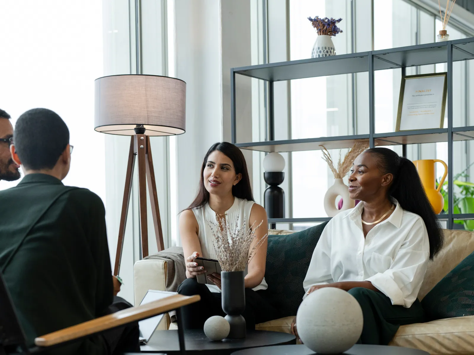 a group of people sitting in chairs