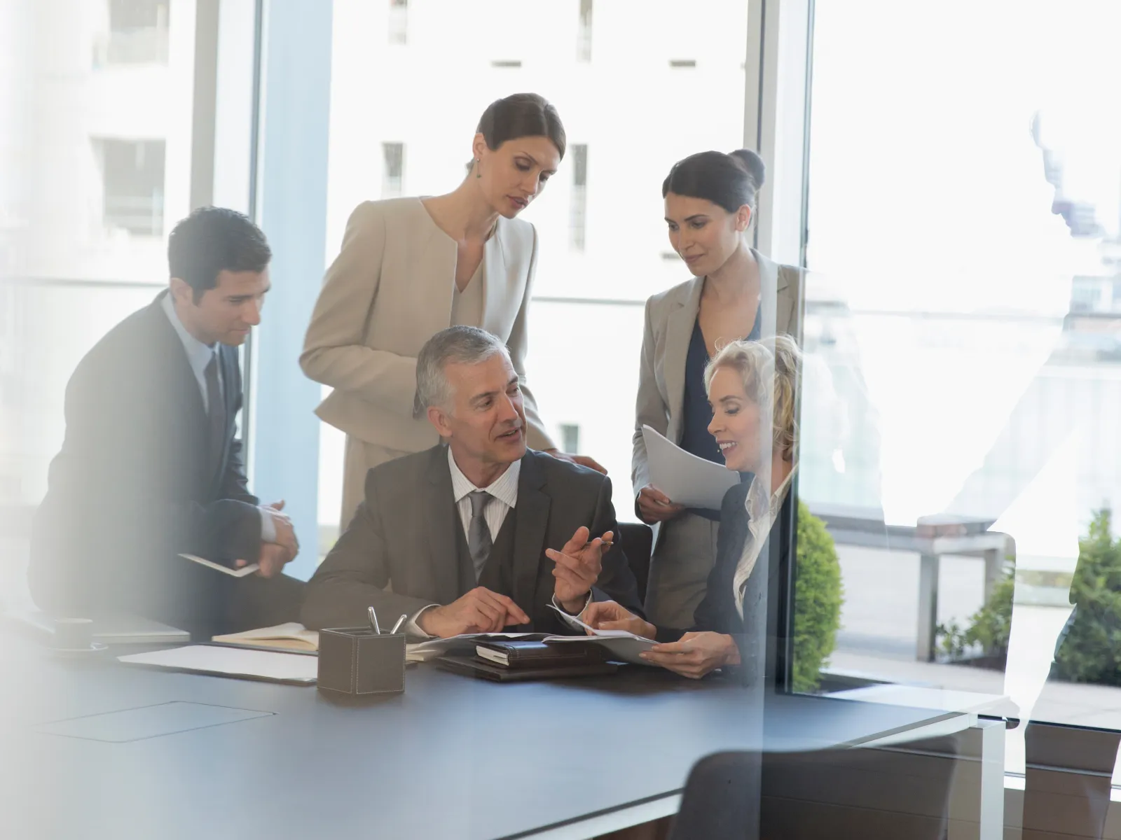 a group of people in a meeting