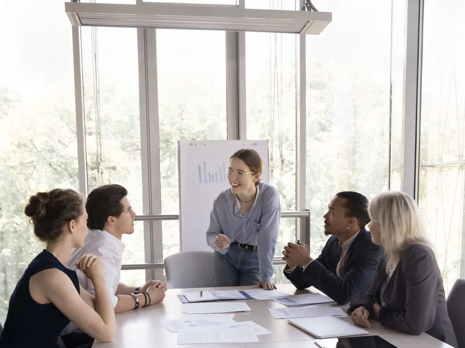 a group of people sitting around a table