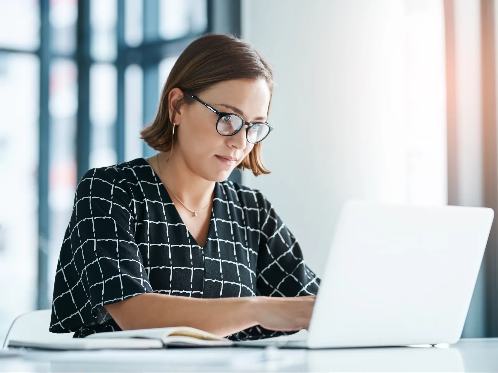 a woman wearing glasses
