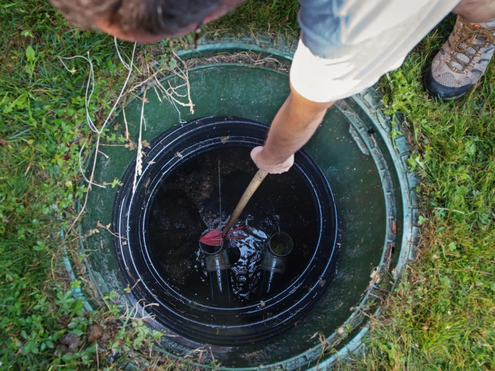 a person cooking food in a pan