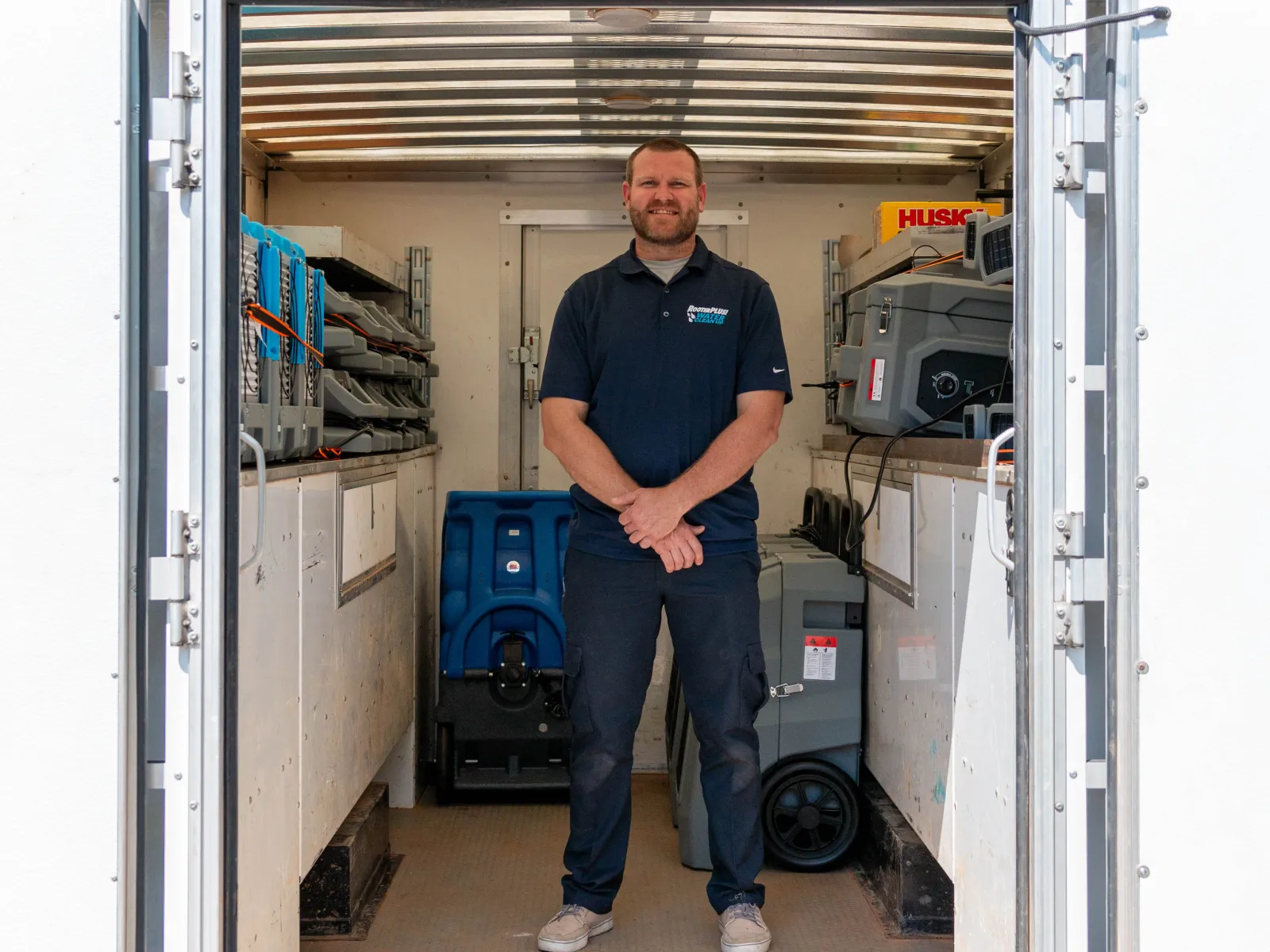 a man standing in a truck