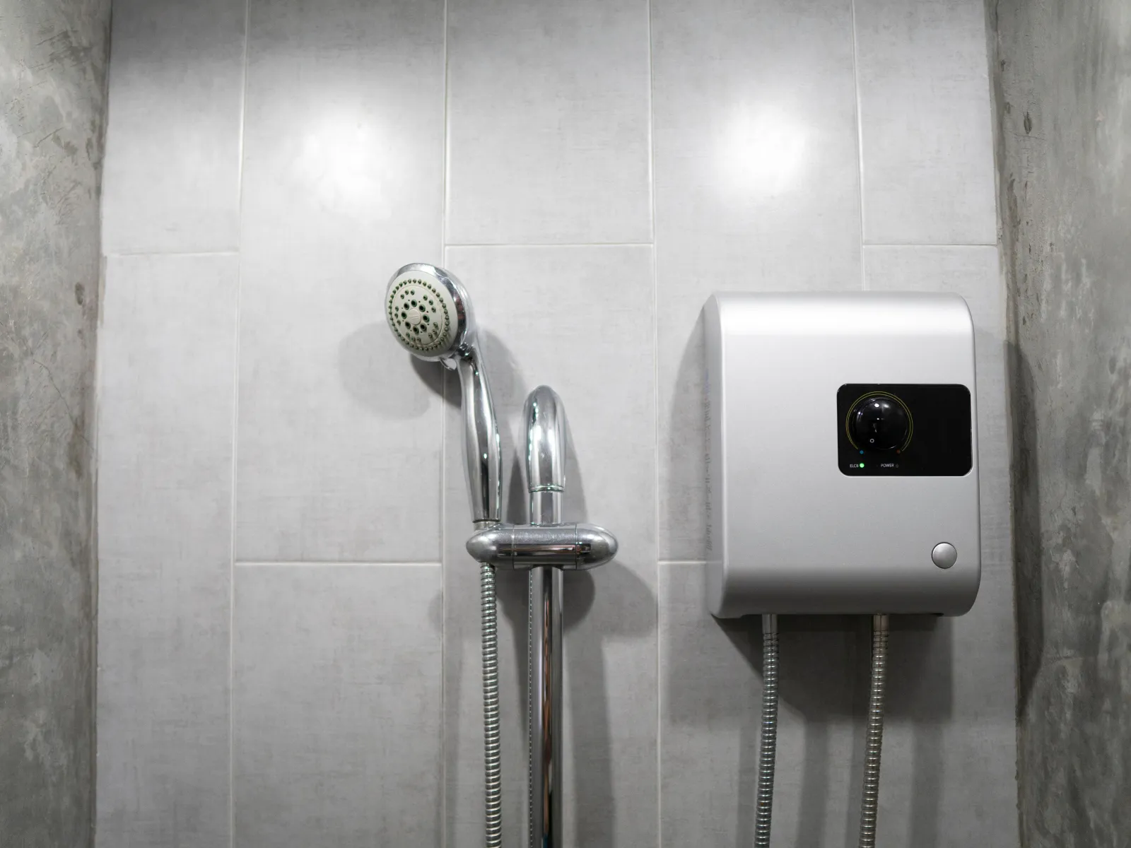 a shower head and a toilet