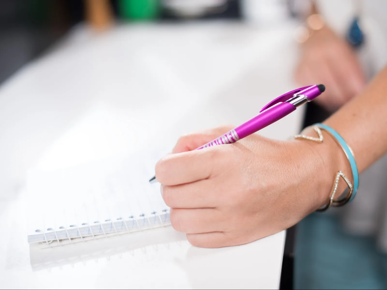 a person holding a pen