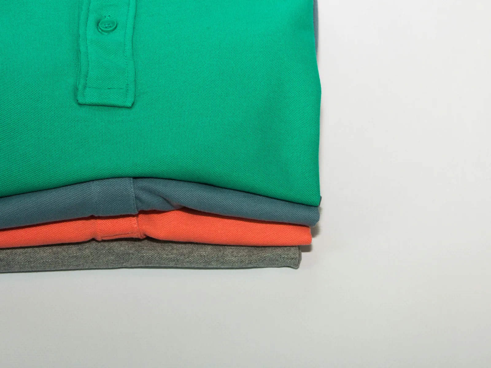 stack of polo shirts