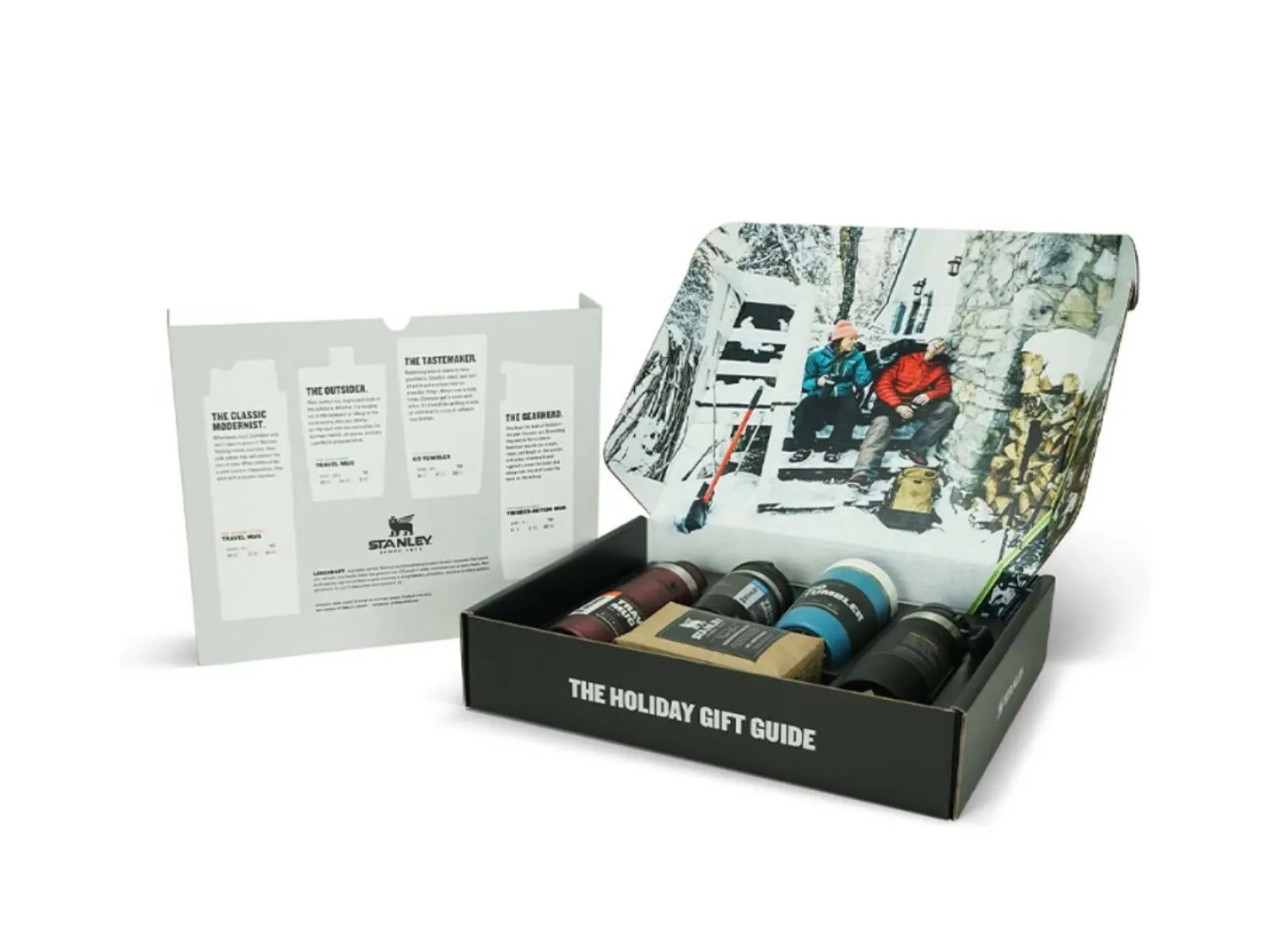 Holiday gift guide set with multiple travel and outdoor accessories in an open black box.
