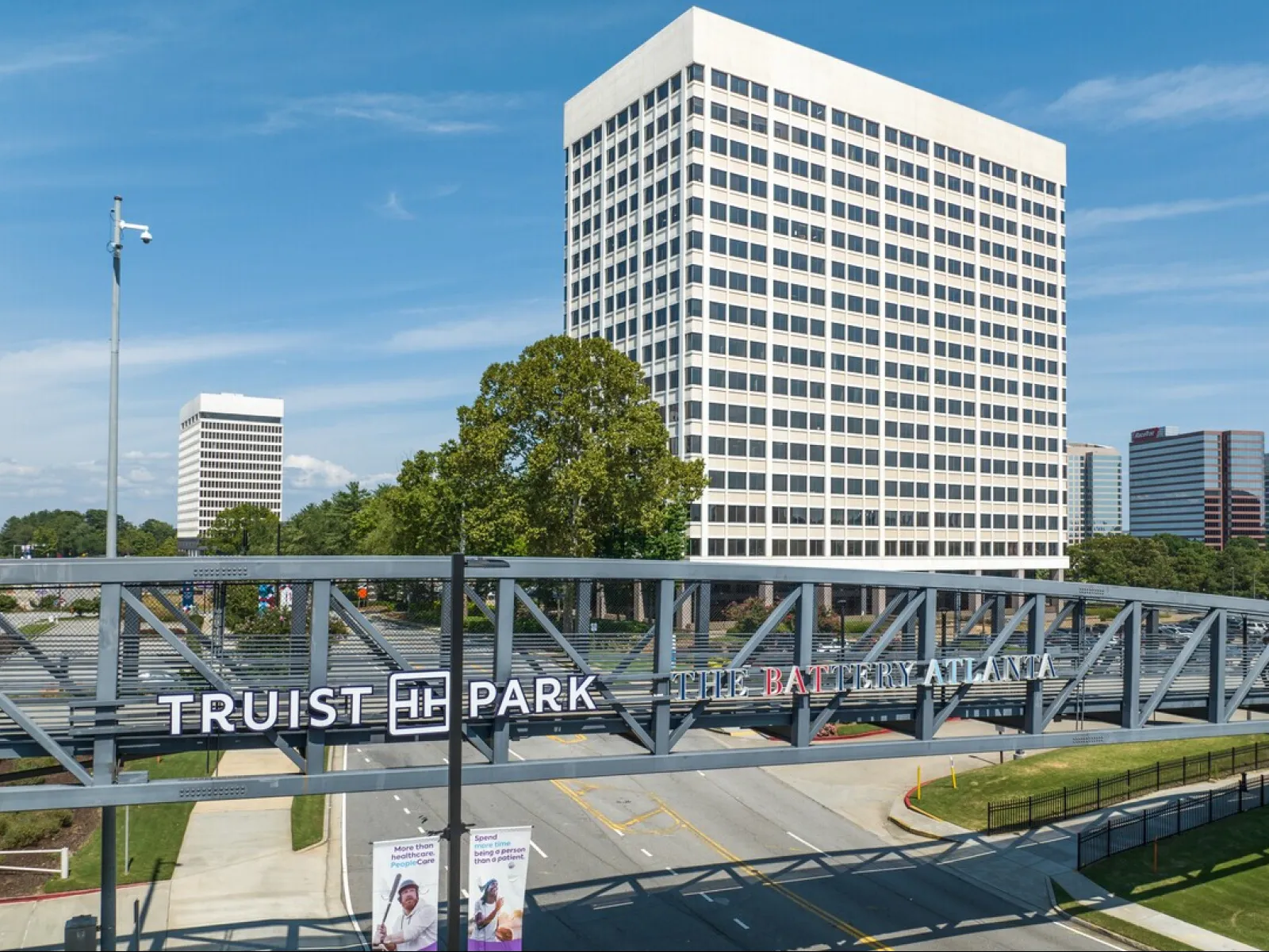 1100 and 900 Circle 75 Parkway in front of the Pedestrian Bridge to Truist Park and The Battery