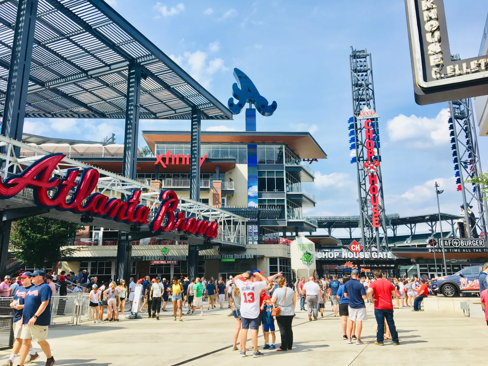 a crowd of people outside of a stadium