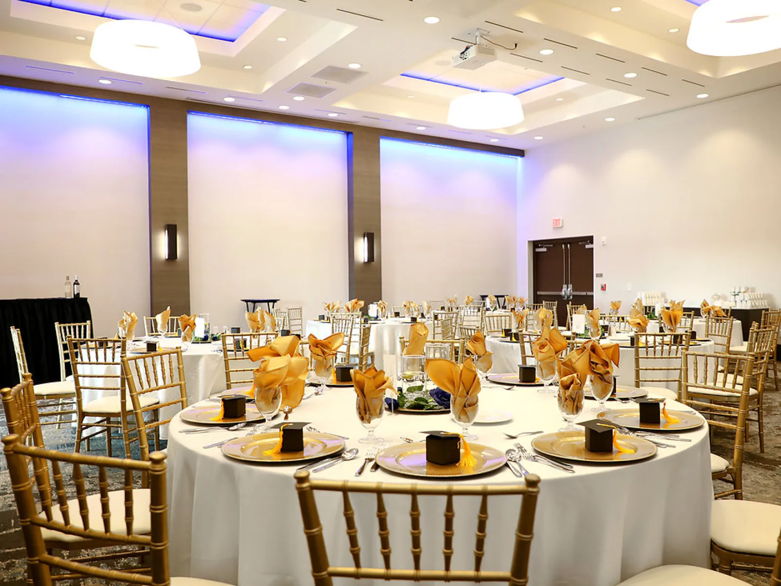 a room with tables and chairs
