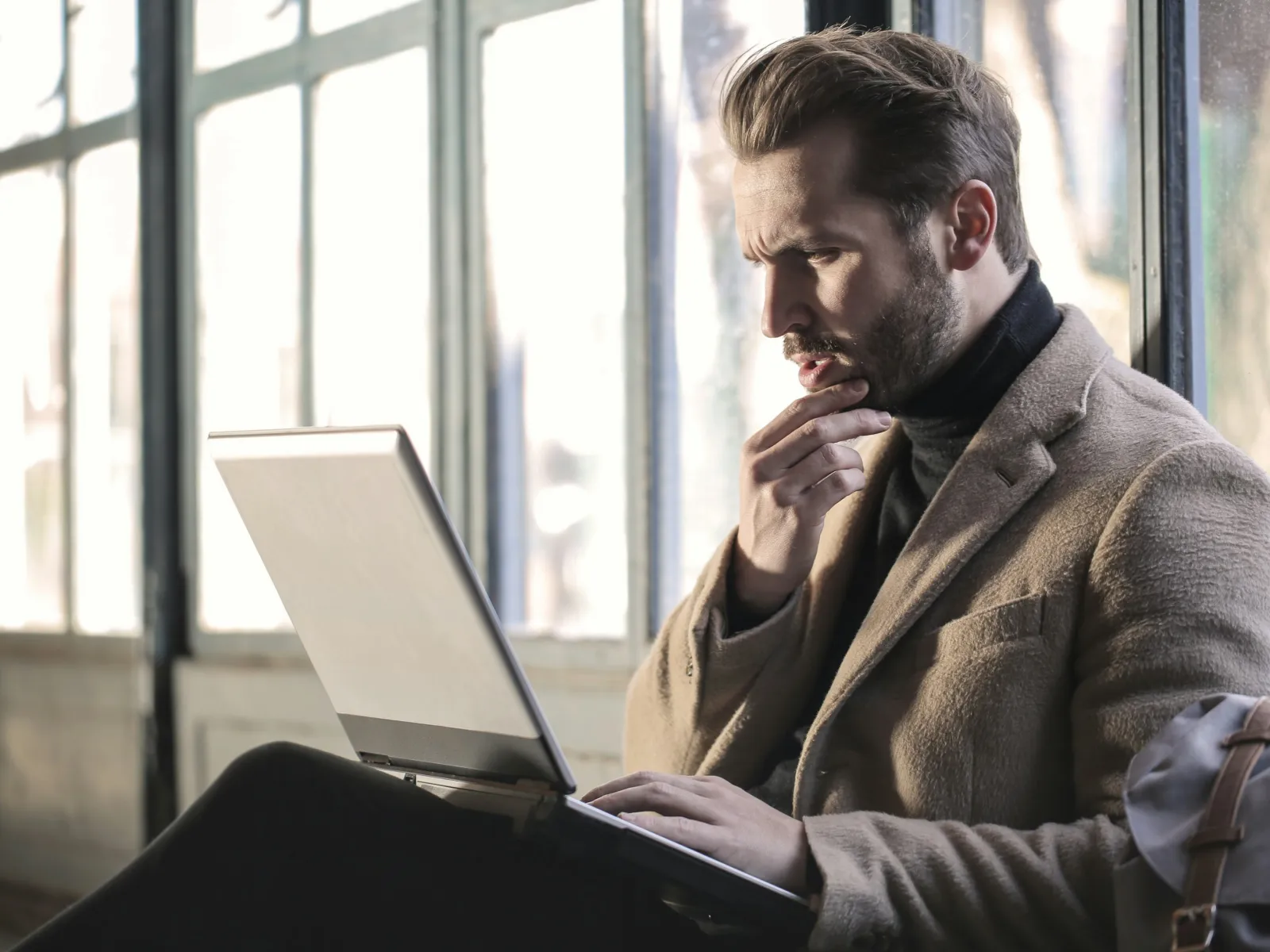 a man using a laptop