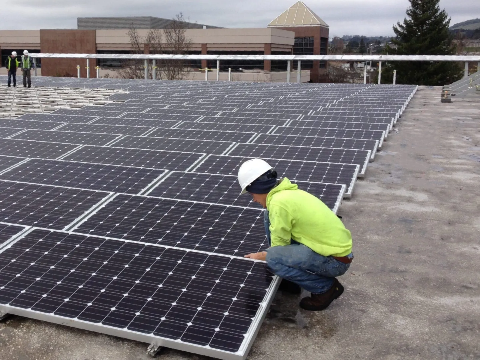 a man working on solar panels