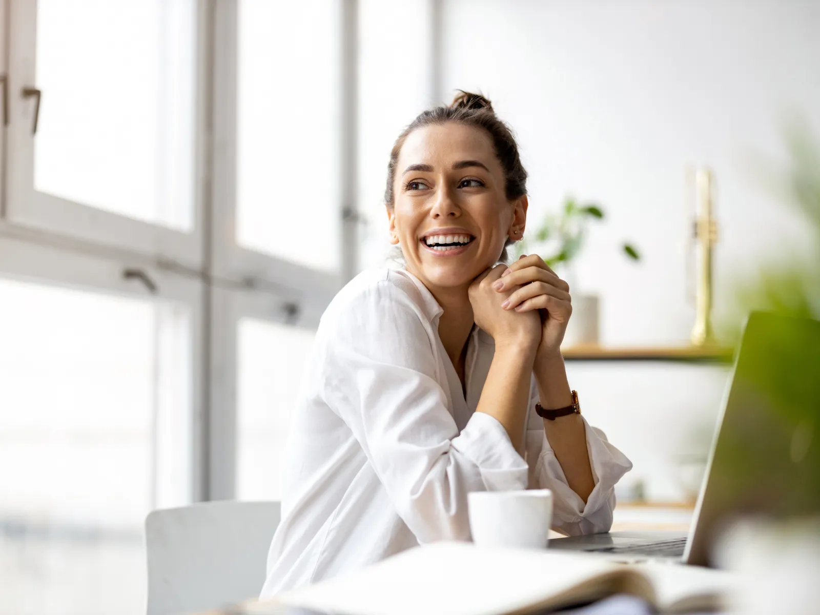 a woman sitting at a table