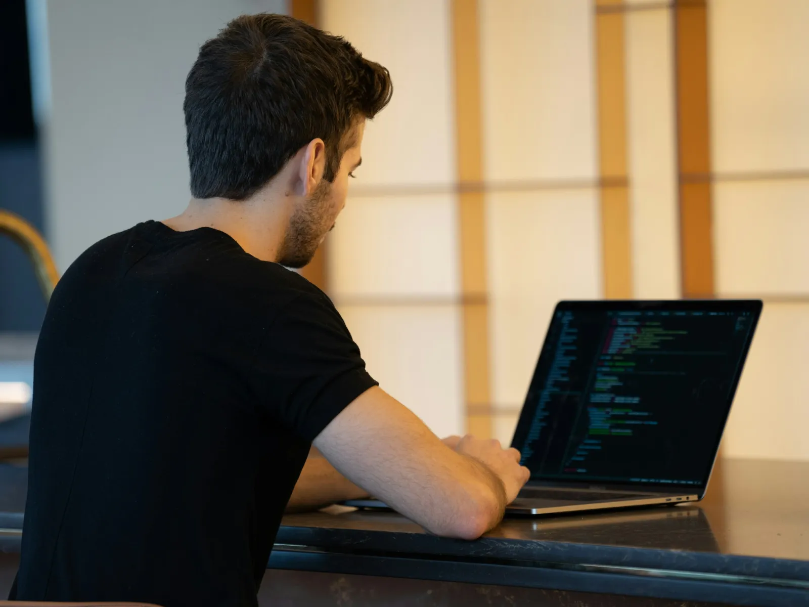 a man using a laptop