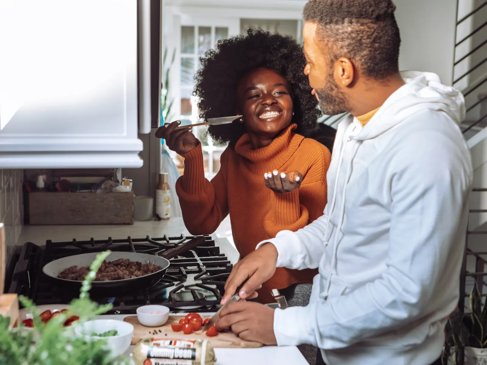a man preparing food in a kitchen