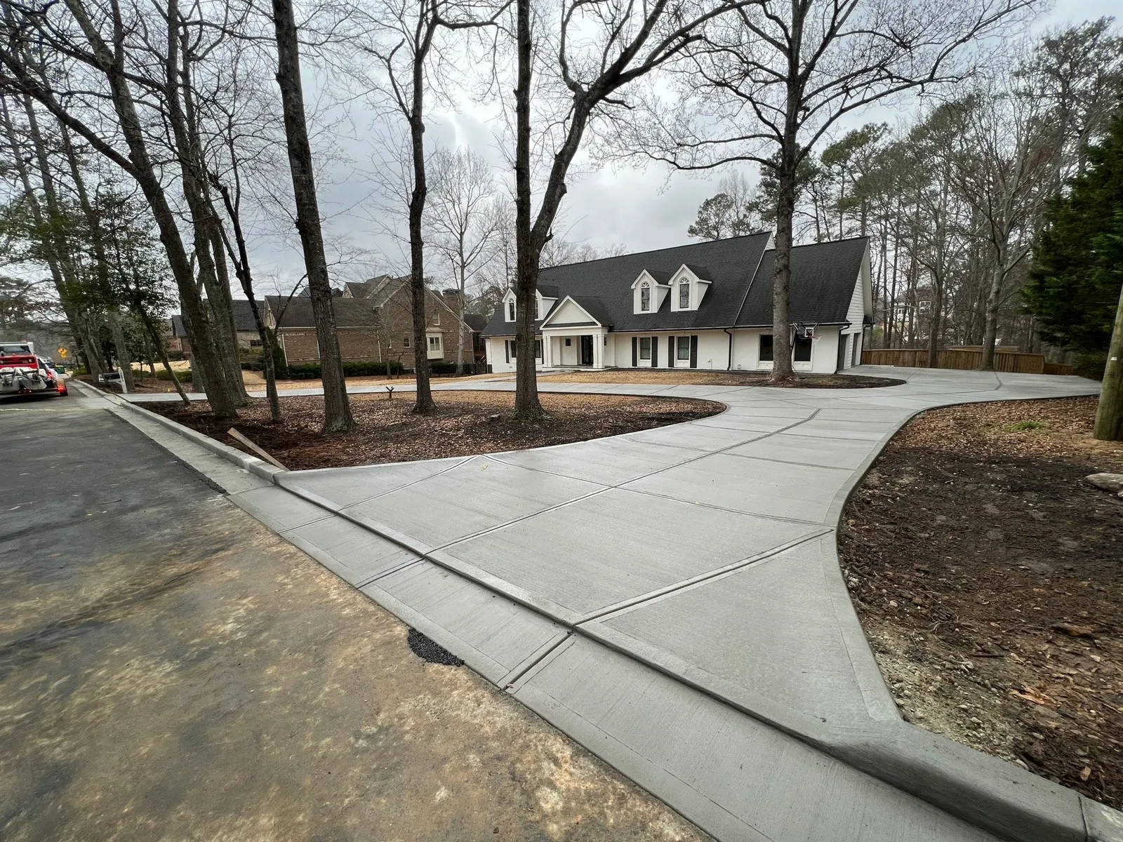 a road with a building on the side