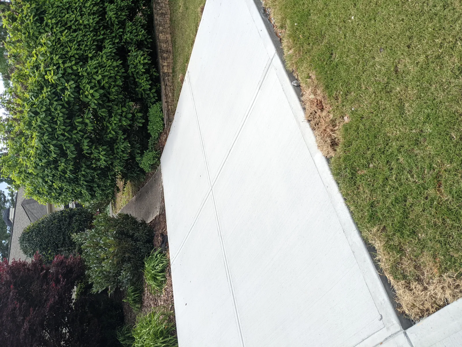 a white tarp on a sidewalk