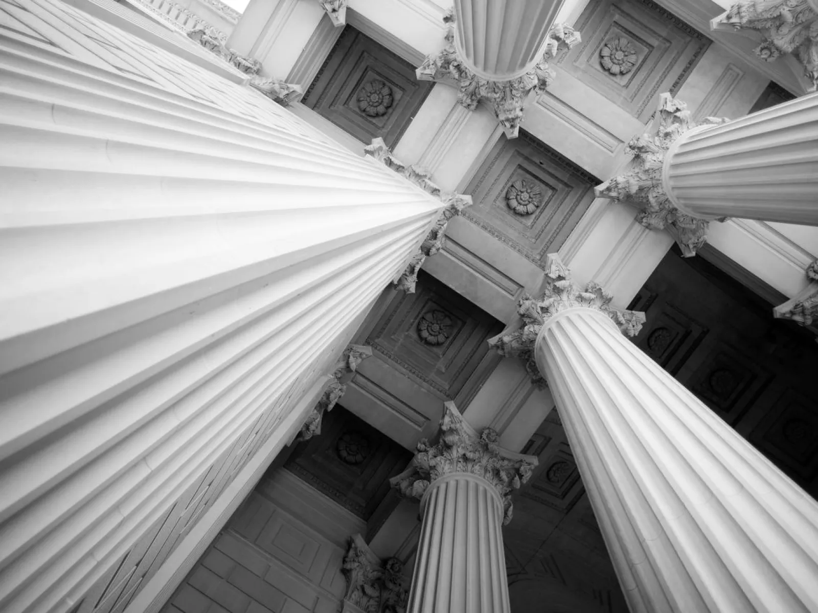 white columns holding up a large building
