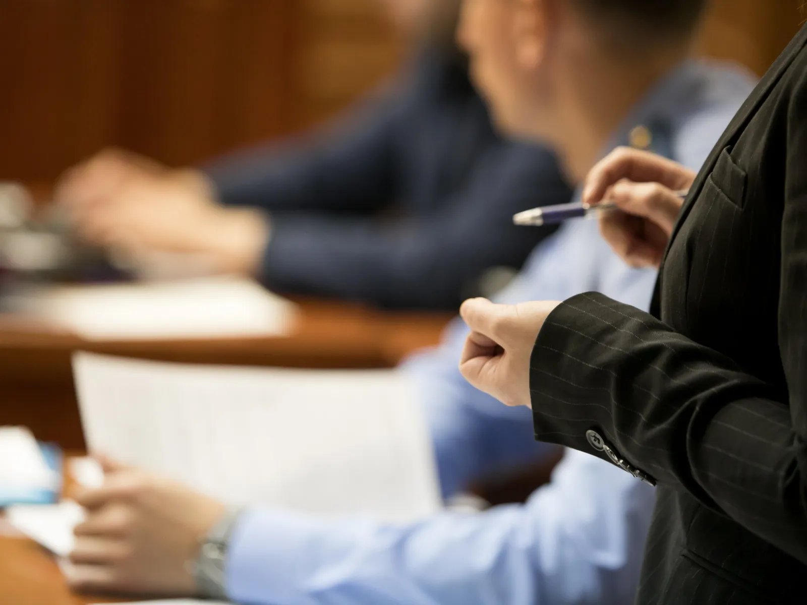 a person standing up in a court room