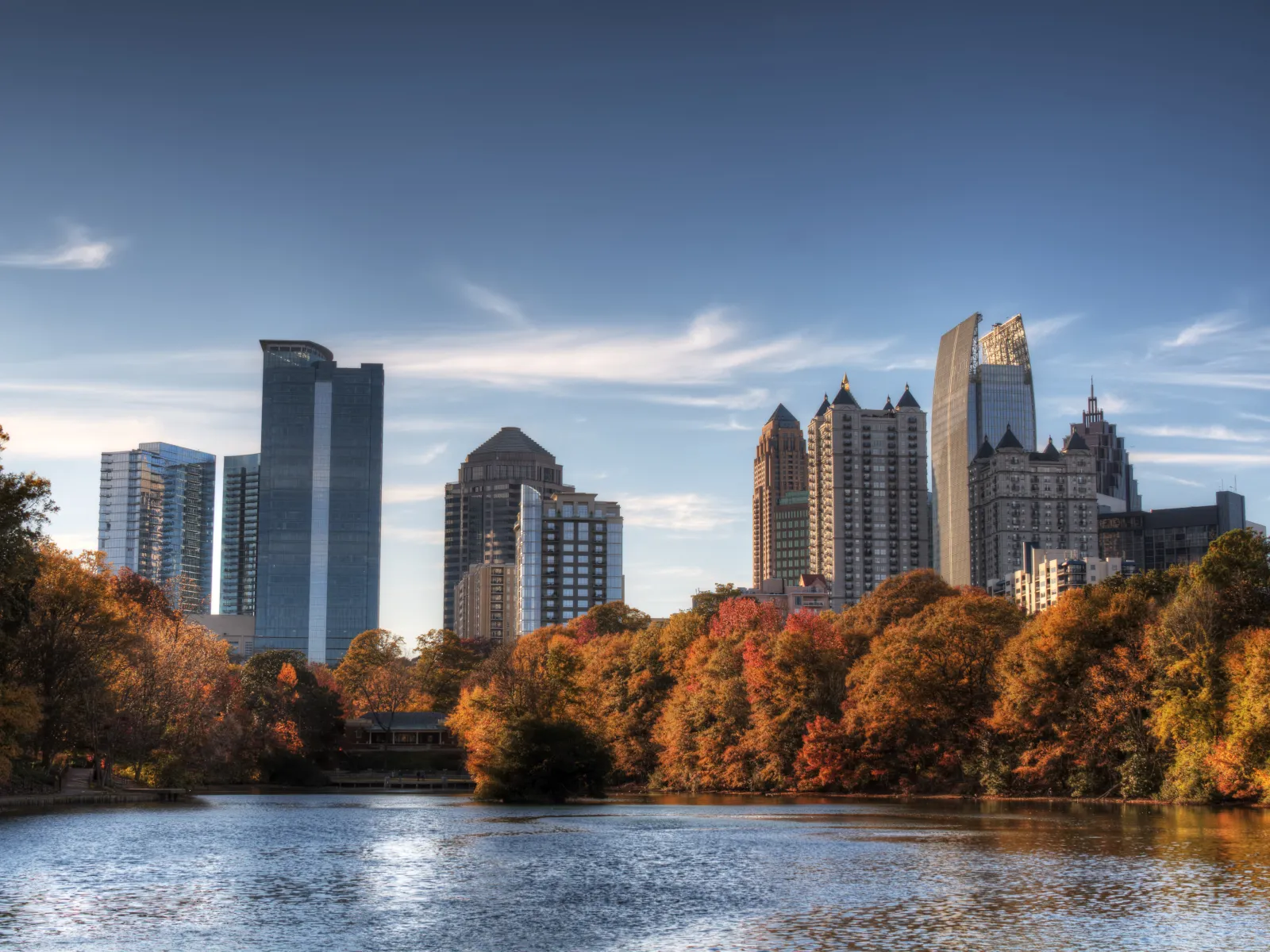 a body of water and trees in front of Atlanta