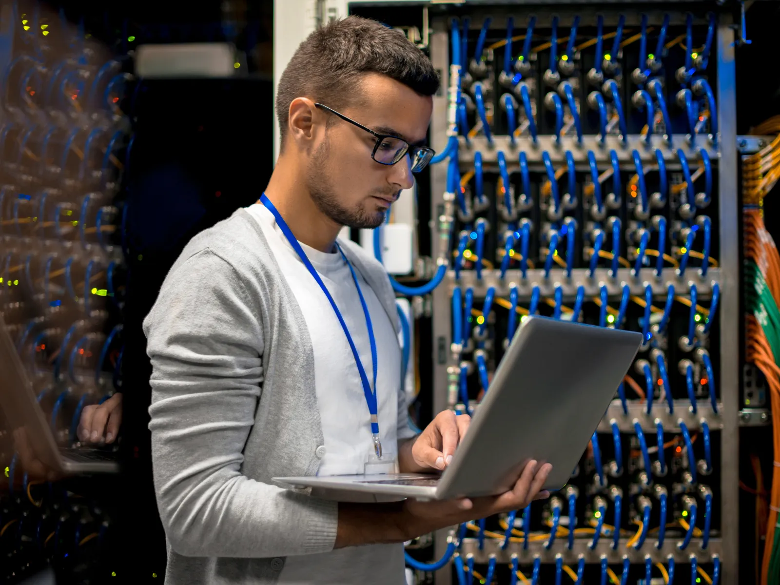 a man holding a laptop