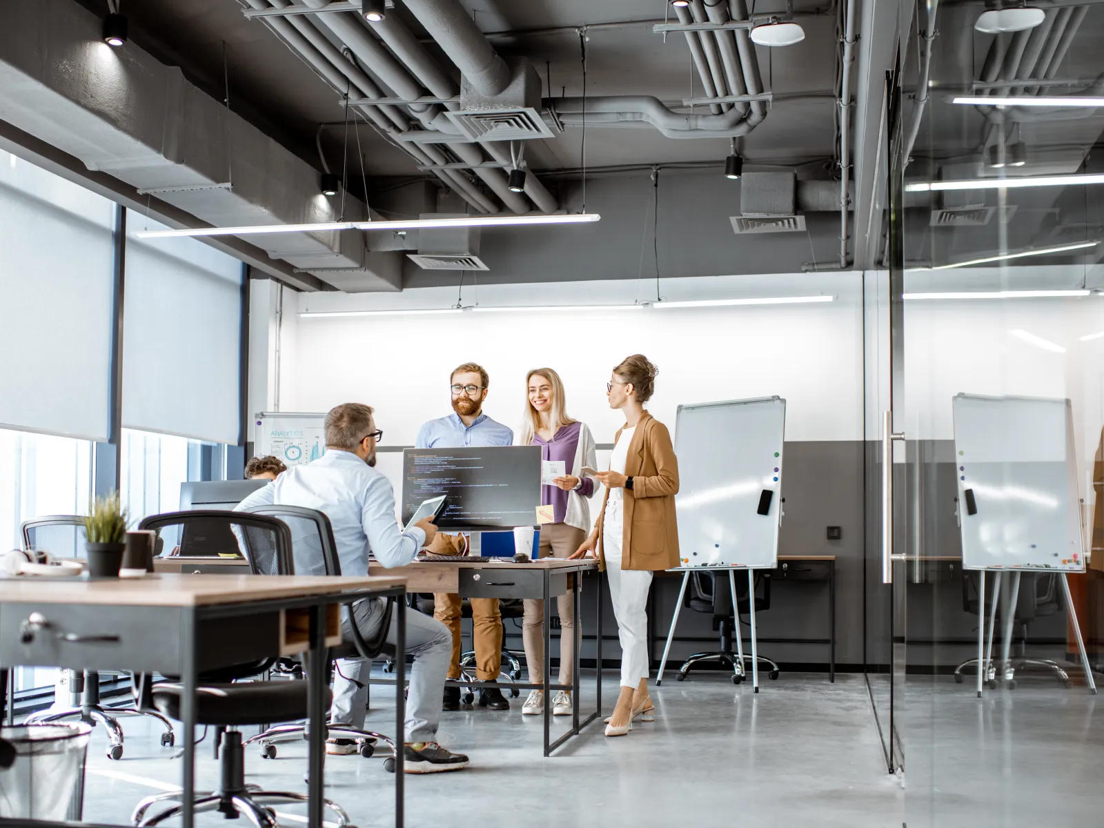 a group of people in an office