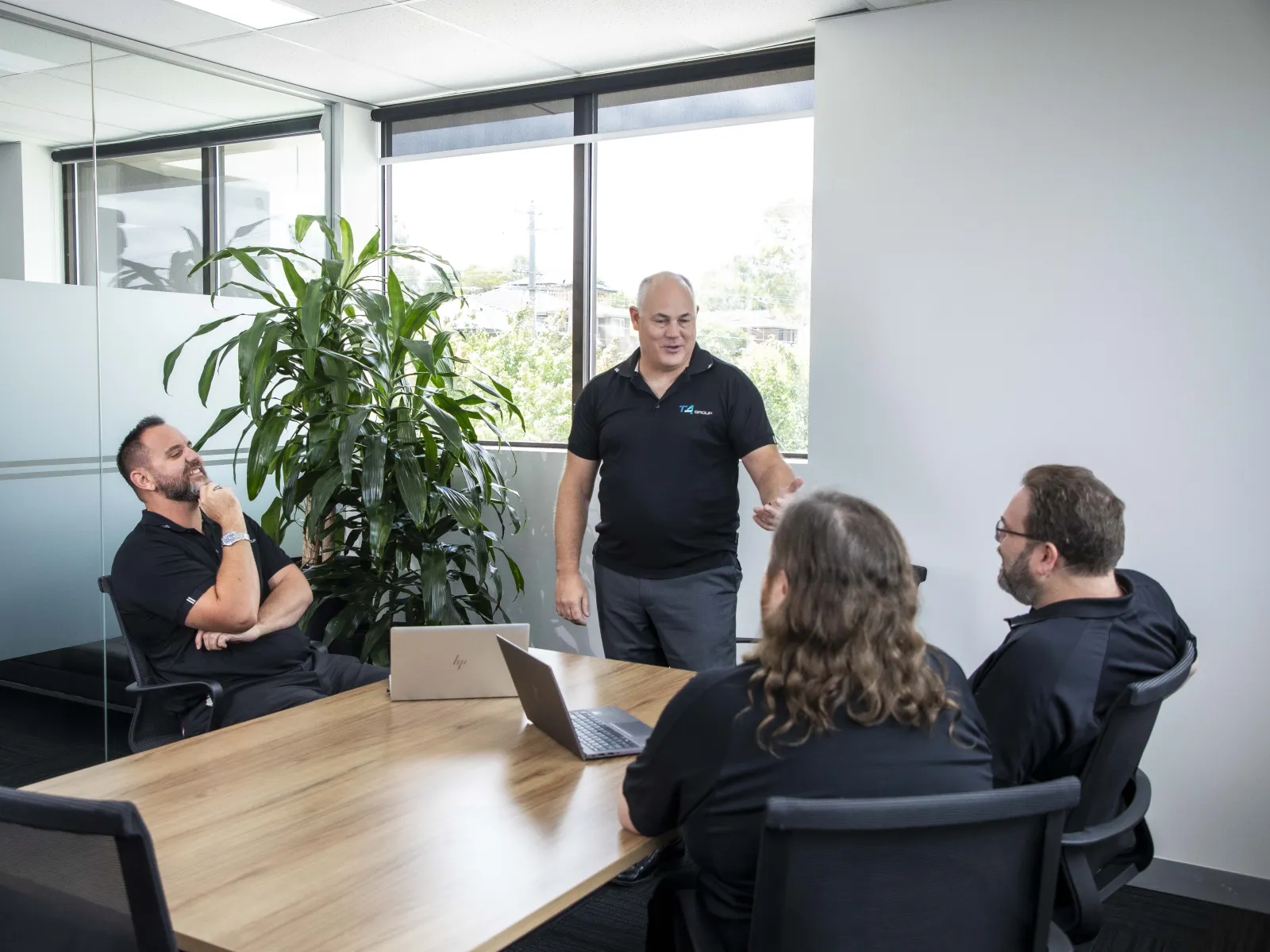 a group of people in a meeting