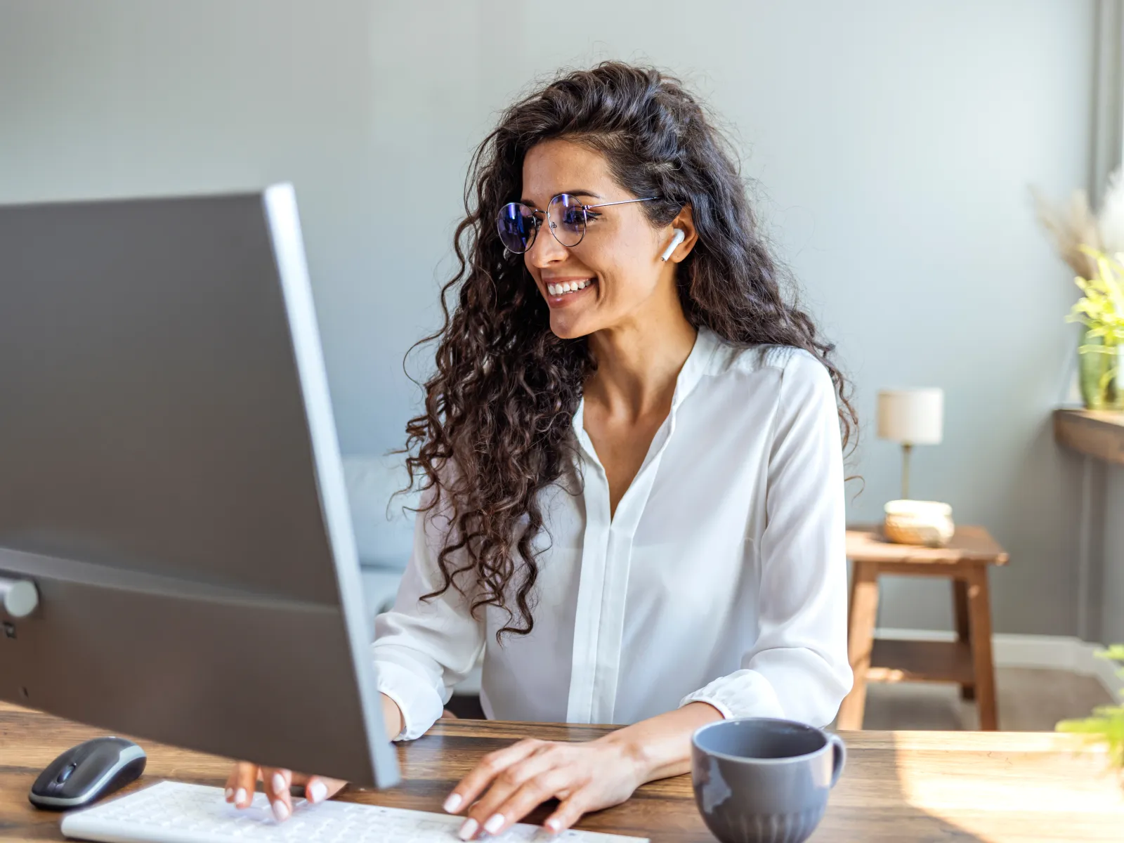 a woman sitting at a desk