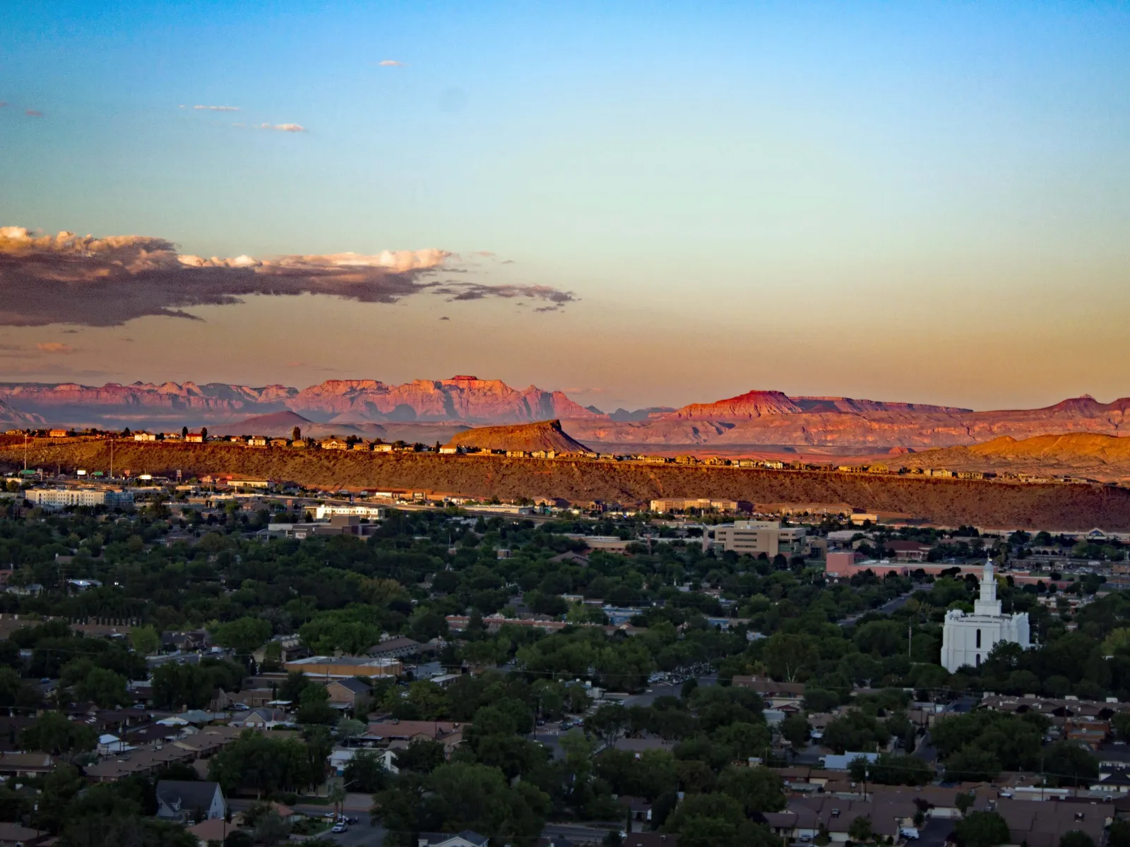 a city with a mountain in the background