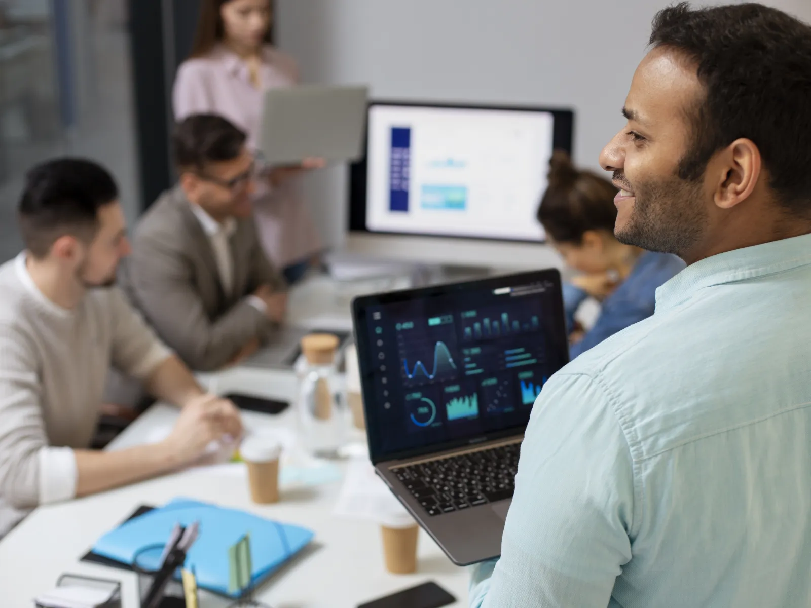 a group of people working in an office