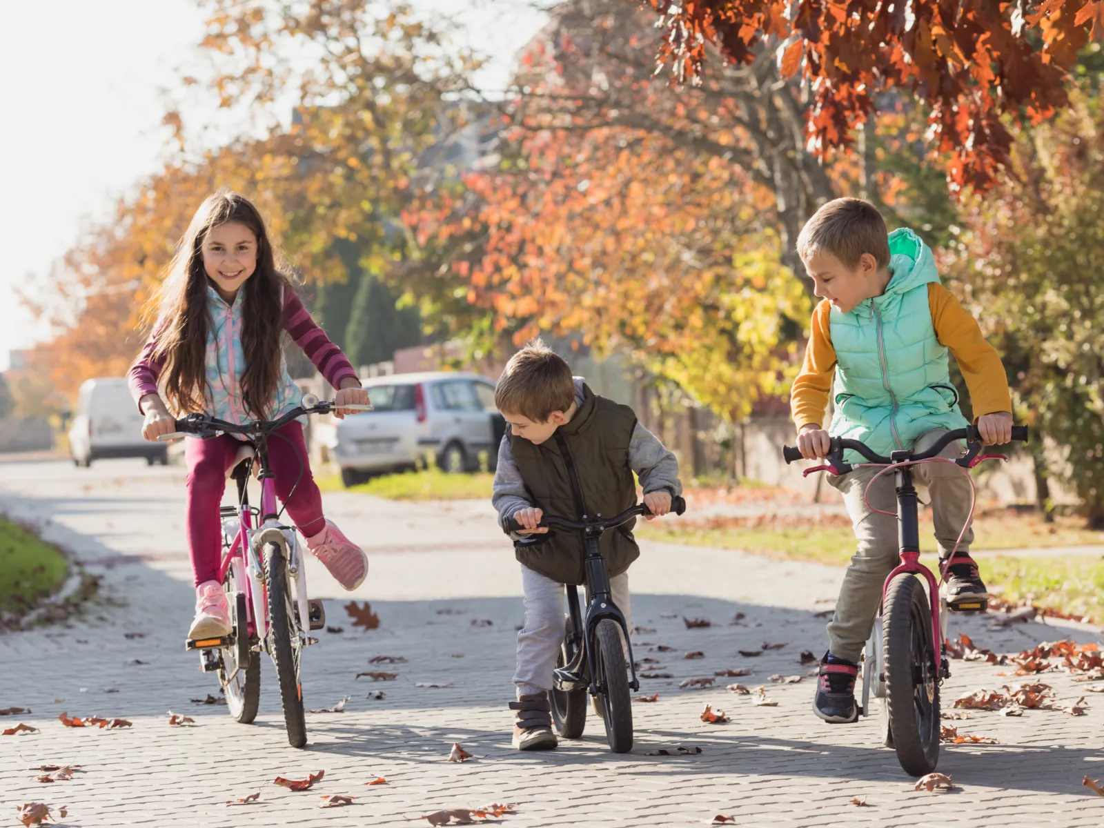 a group of kids riding bikes