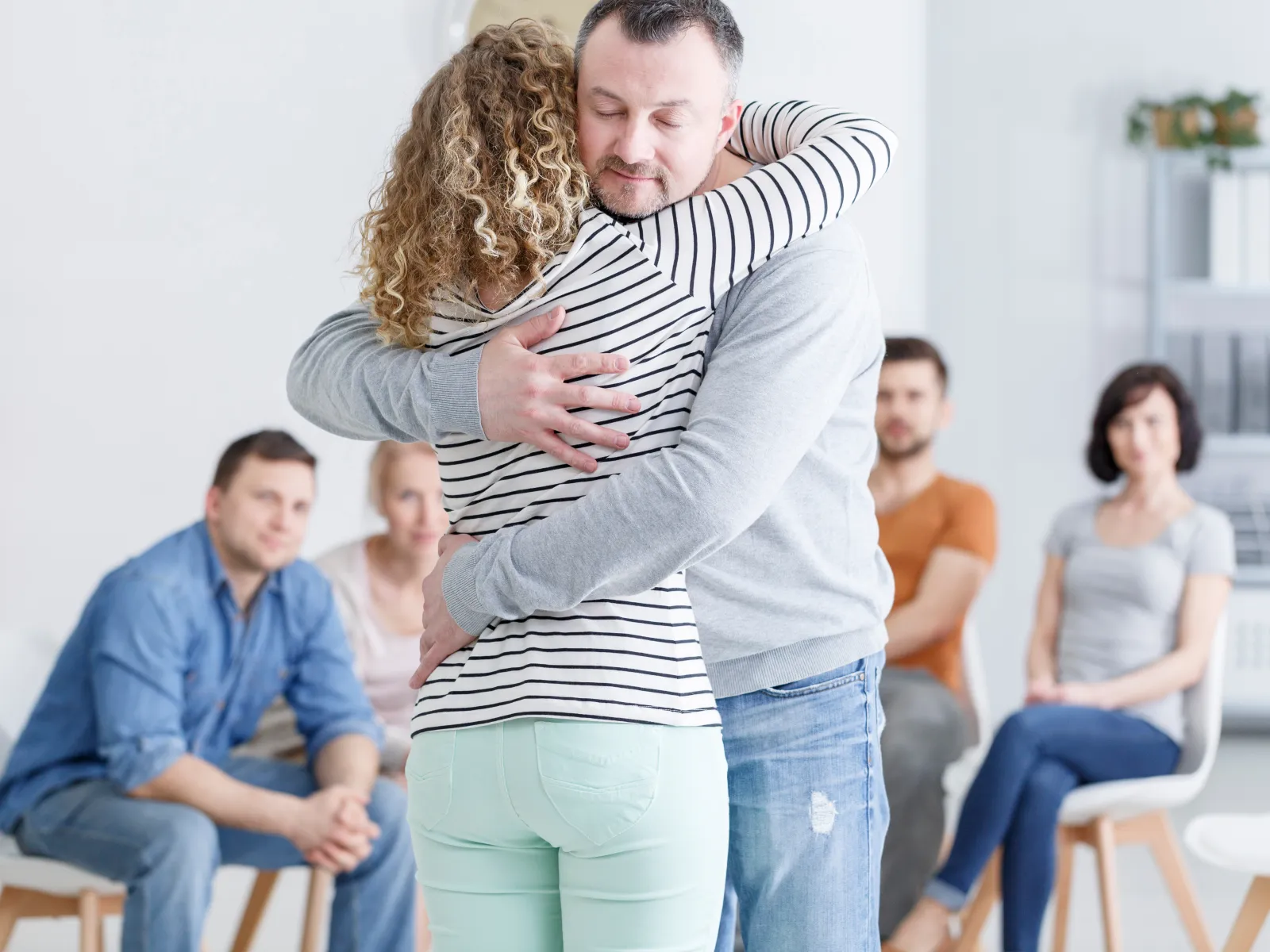 a man and woman hugging