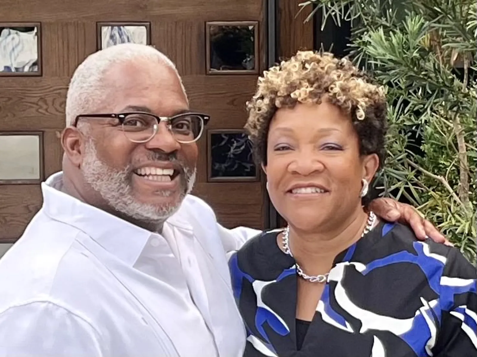 a man and woman smiling