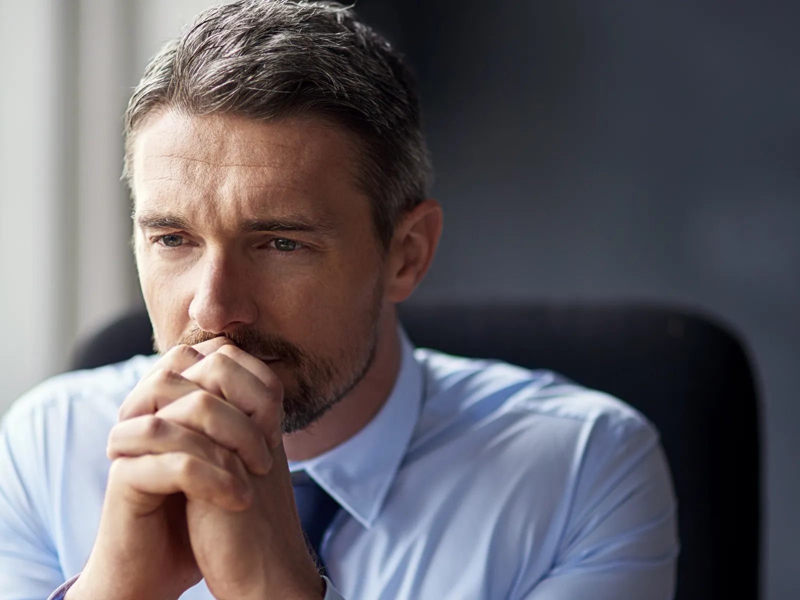 a man in a blue shirt