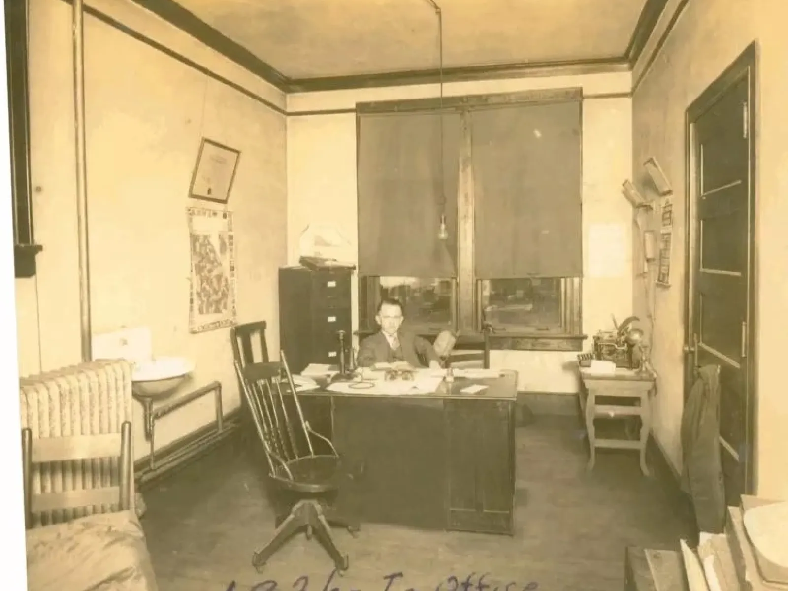 a room filled with furniture and a large window