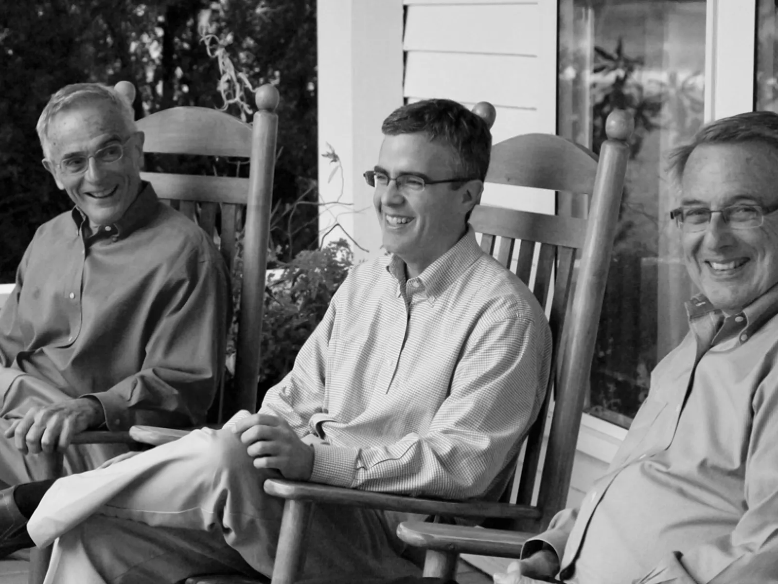 a group of people sitting posing for the camera