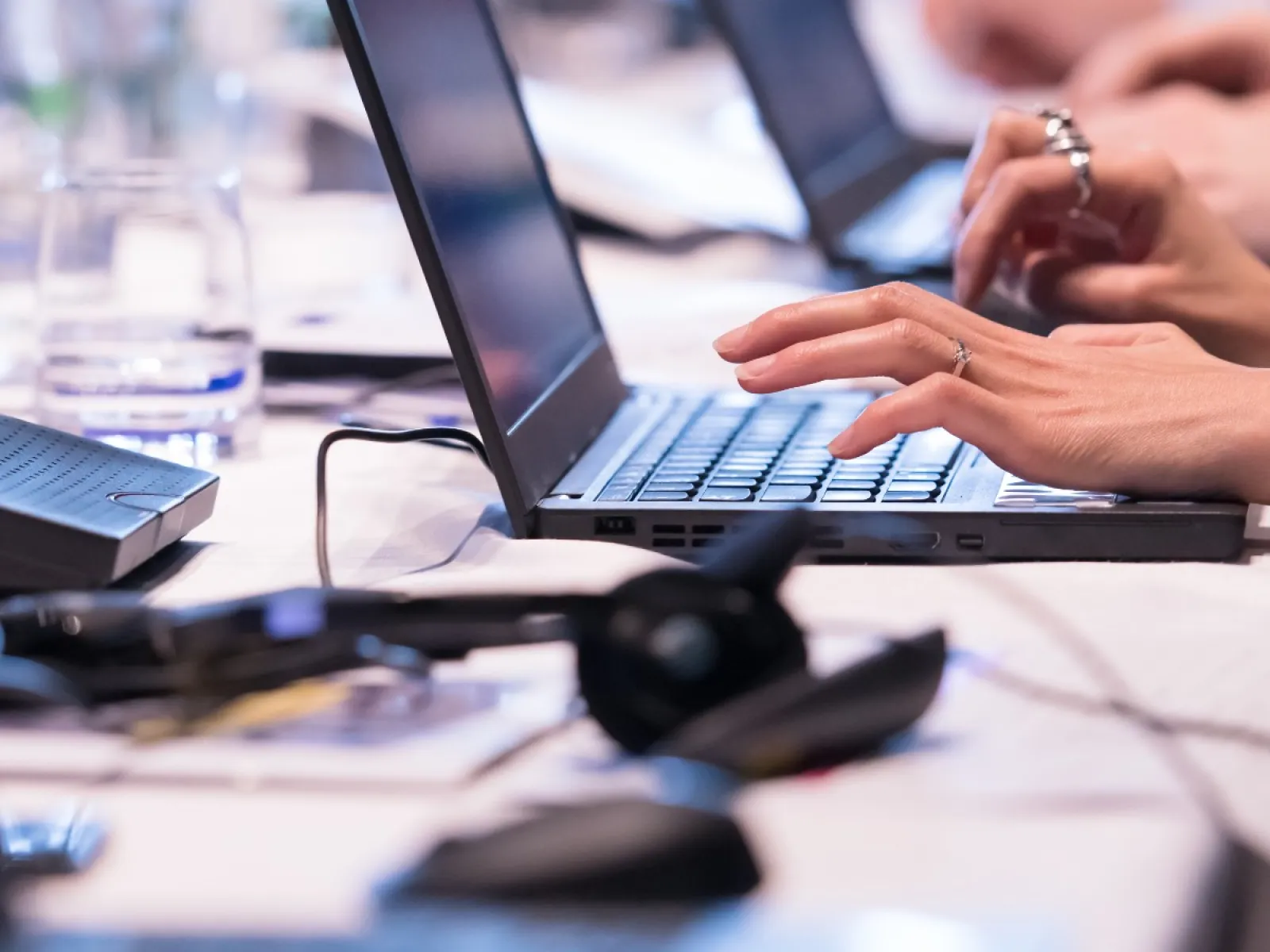 people using laptops on a table