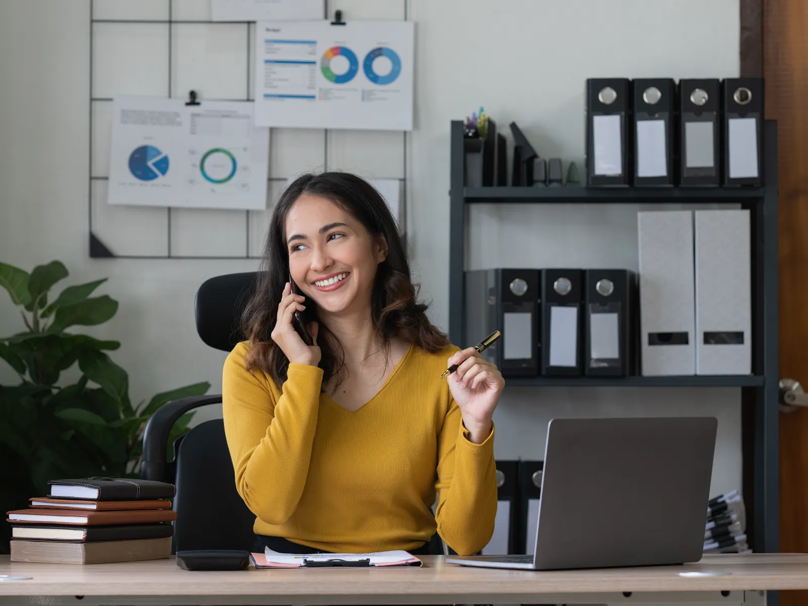 a woman sitting at a desk