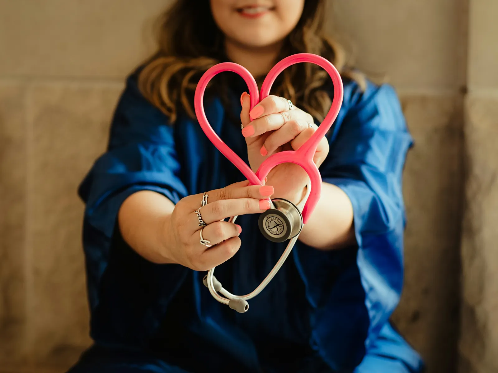 a person holding a pair of scissors