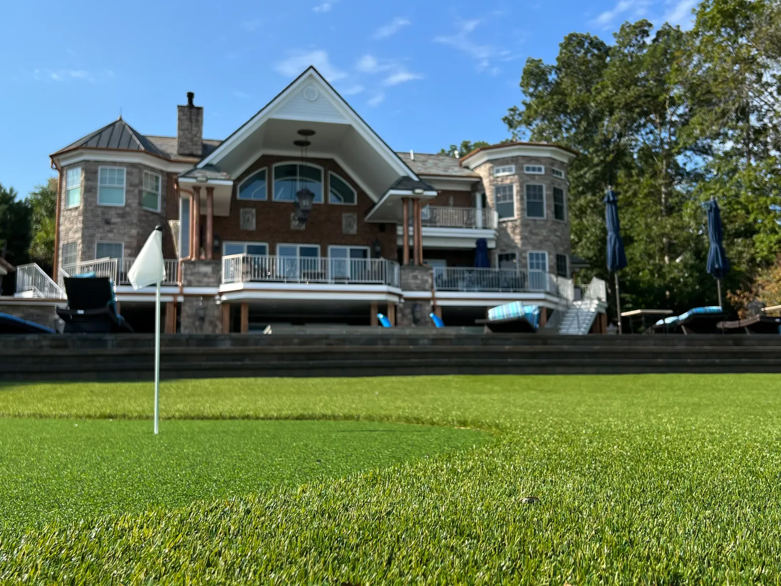 a large house with a lawn in front of it