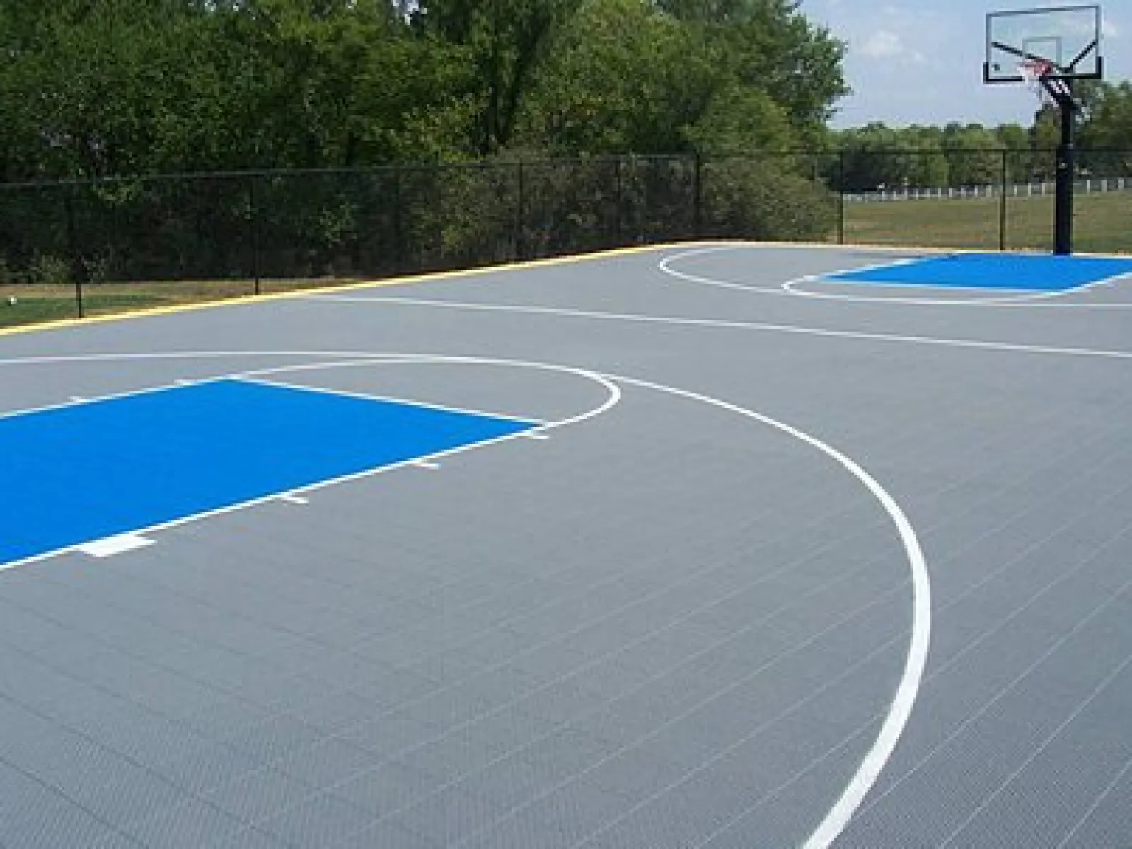 a basketball court with a basketball hoop