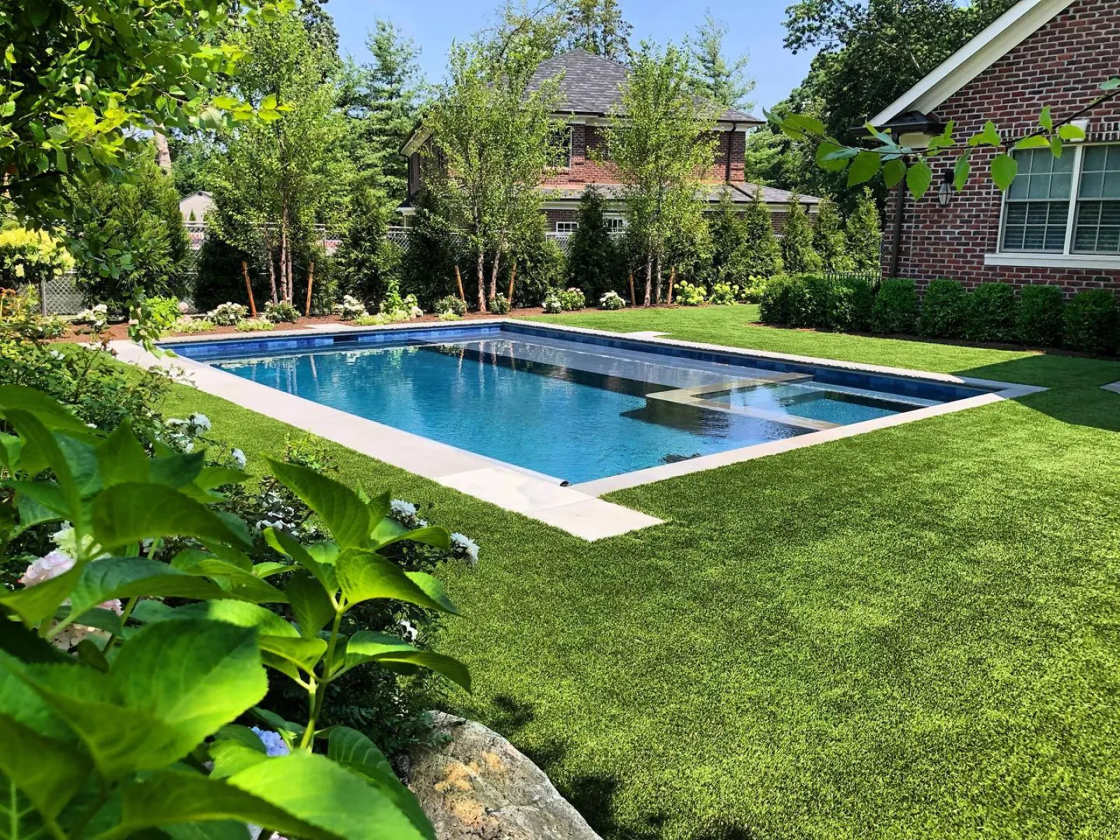 a swimming pool in a backyard