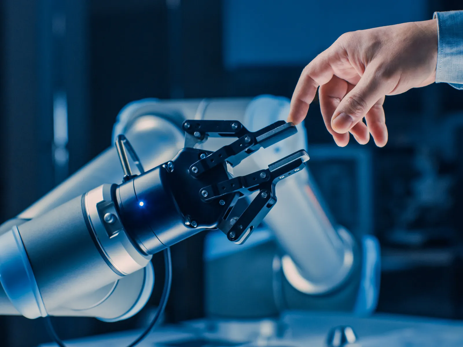 a hand holding a metal object