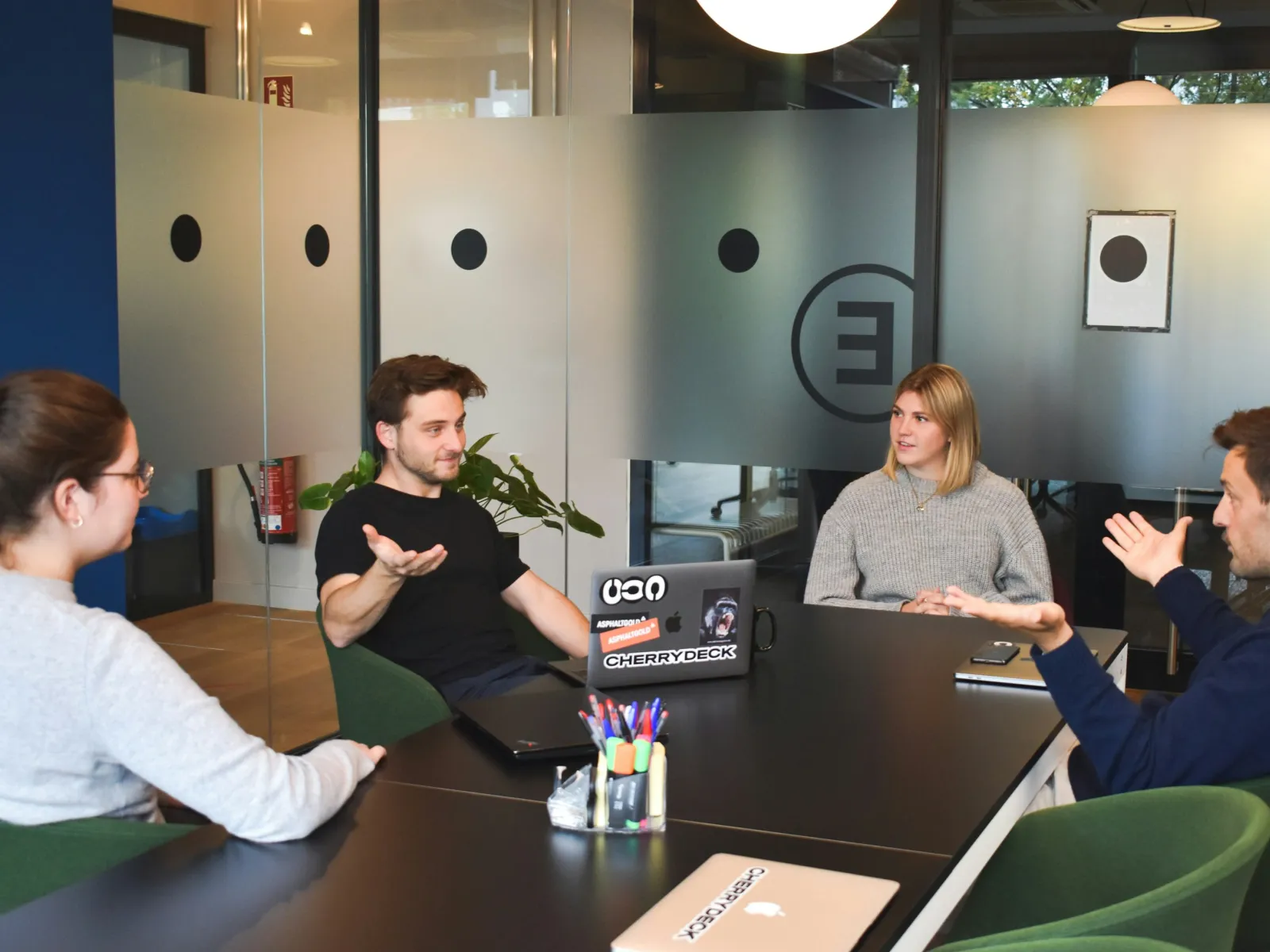 a group of people sitting around a table