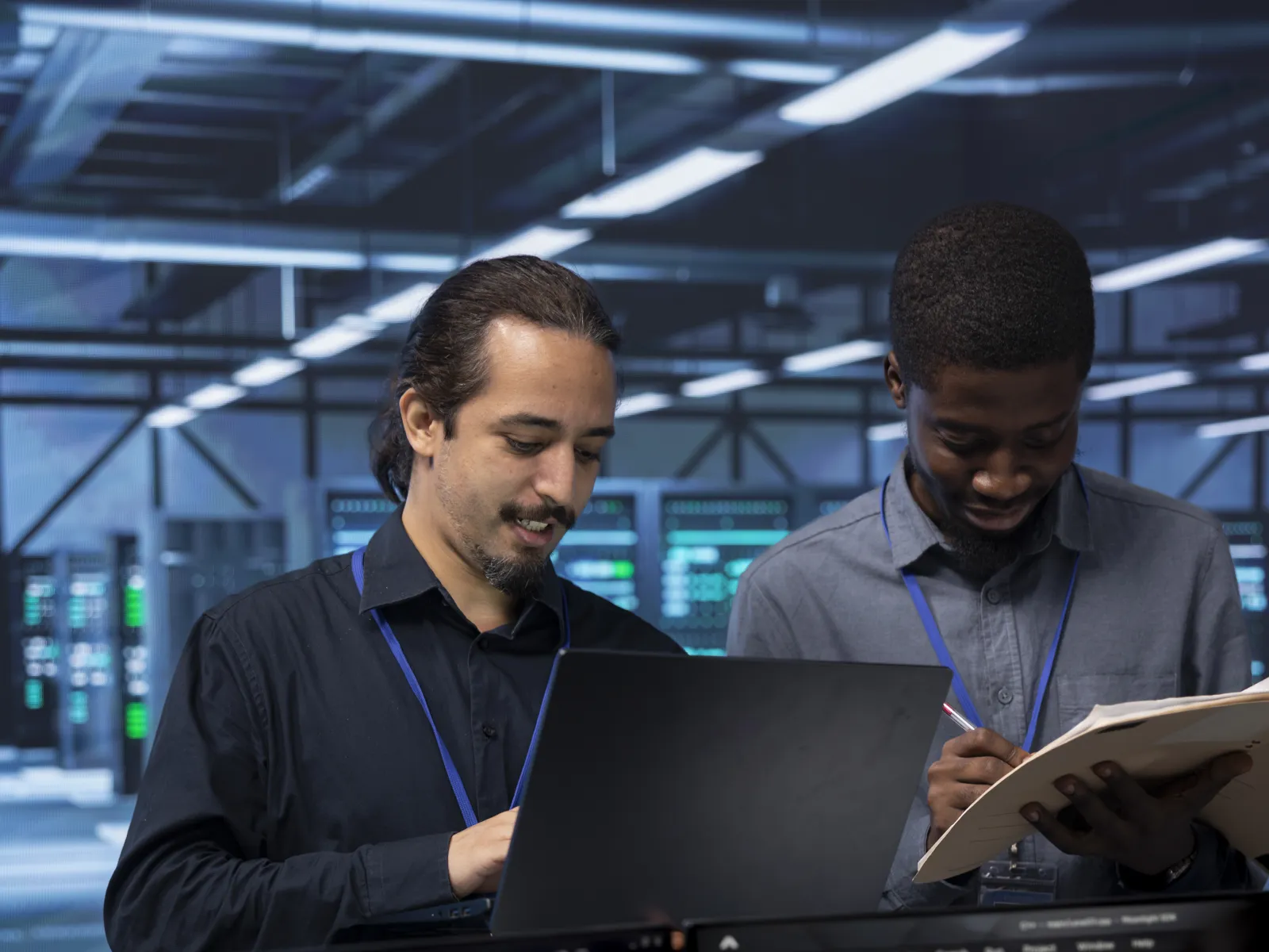 a few men working on computers