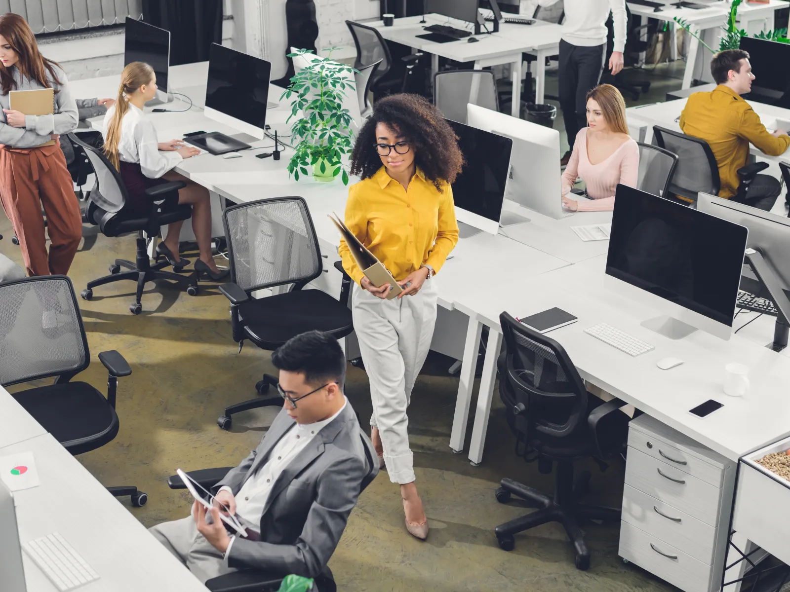 a group of people in an office