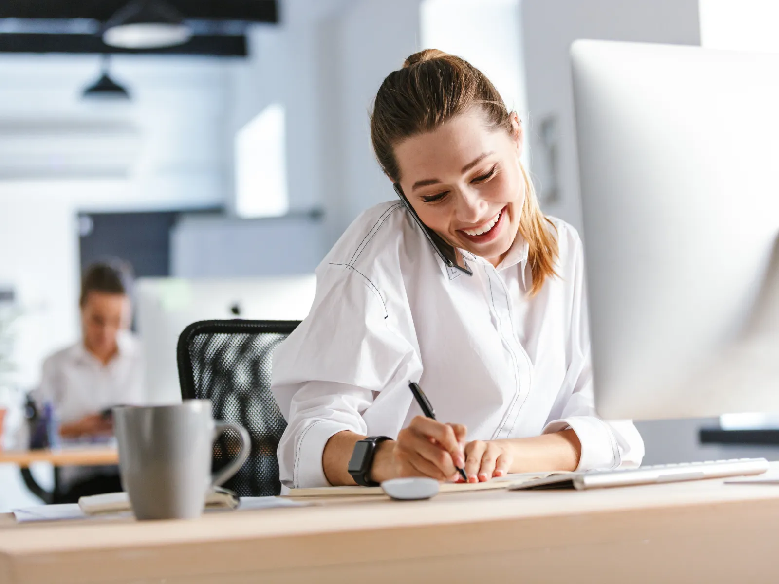 a person sitting at a desk